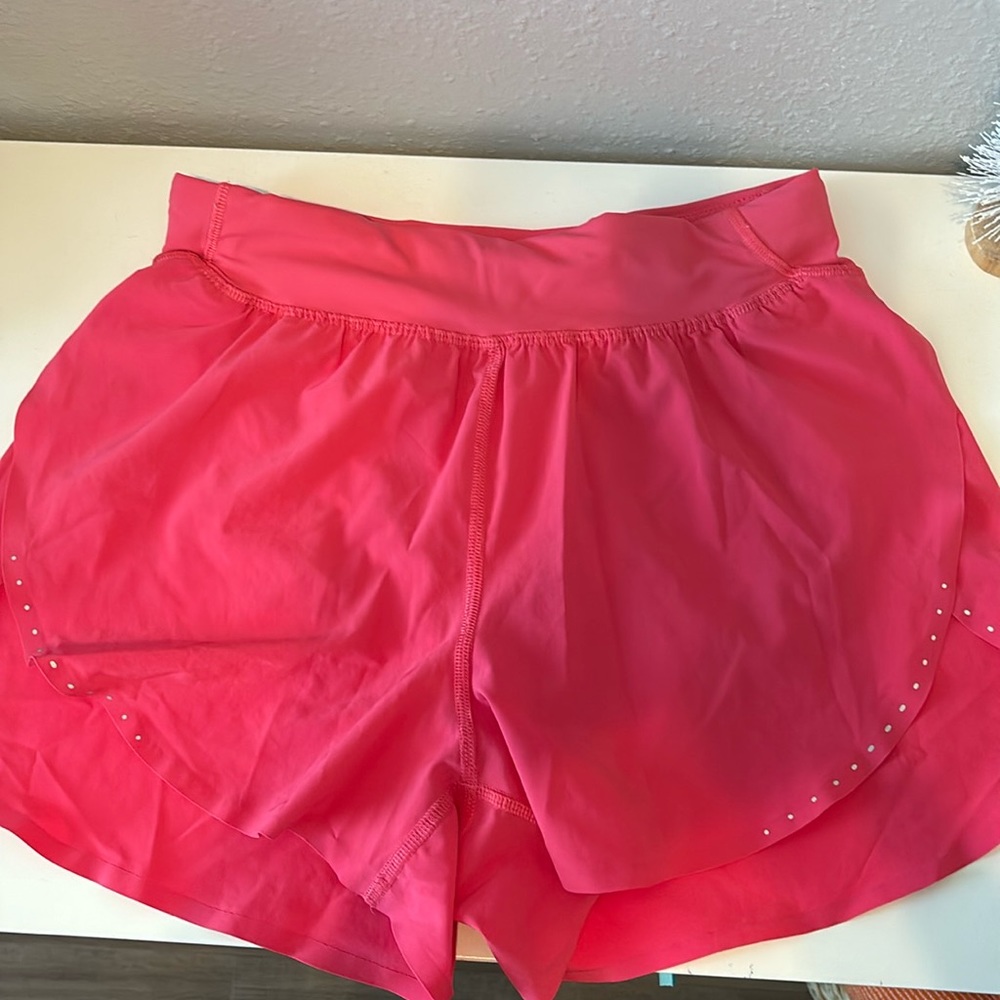 Almost brand new Fast and free reflective lululemon shorts size 4. 3” inseam